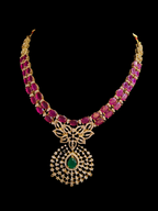 Gold necklace with red beads